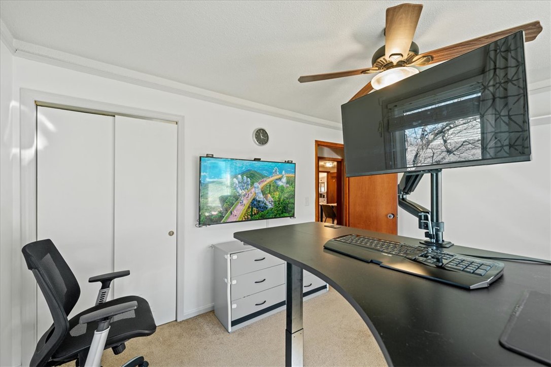 6 Fuller Street Pelzer, SC 29669 - Photo 23 of 36 This versatile room offers bright interiors and practical amenities for focused productivity.