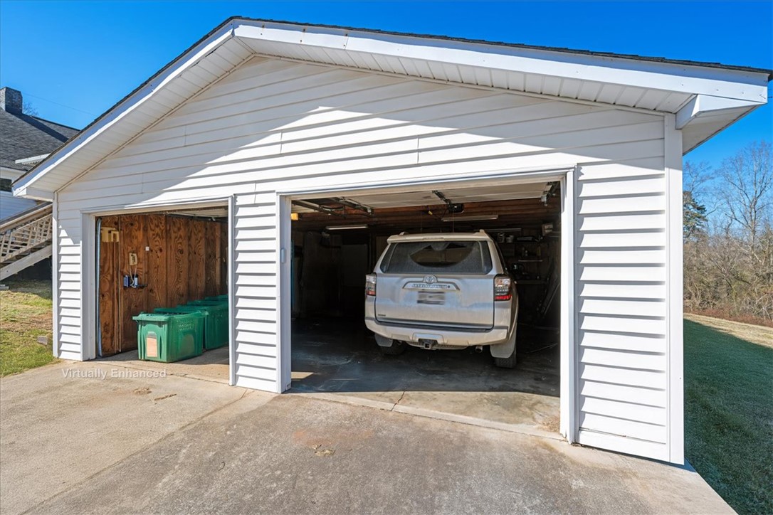 6 Fuller Street Pelzer, SC 29669 - Photo 32 of 36 This garage offers convenient parking and additional storage options.