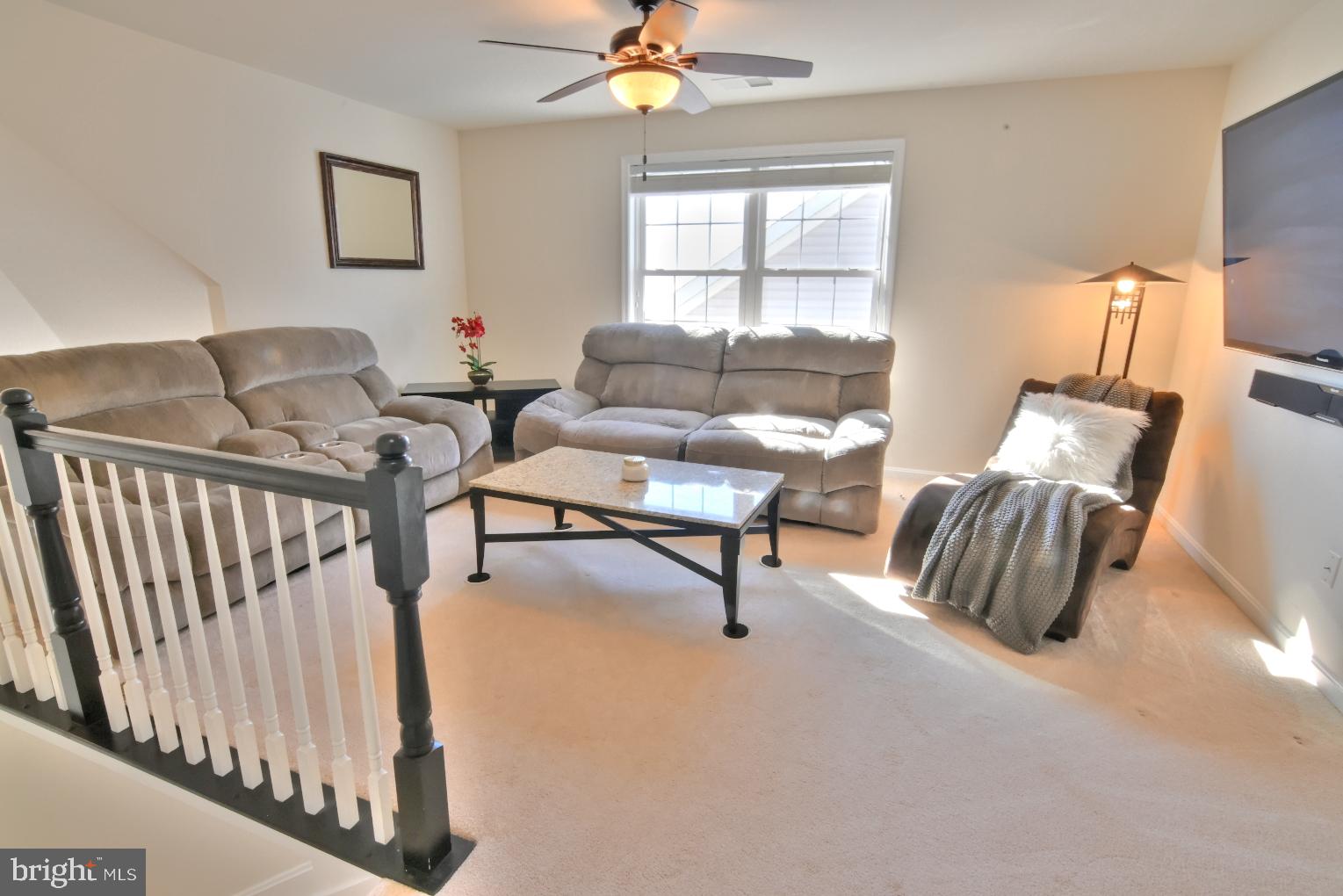 13170 Triple Crown Loop Gainesville, VA 20155 - Photo 49 of 71 a living room with furniture and a window
