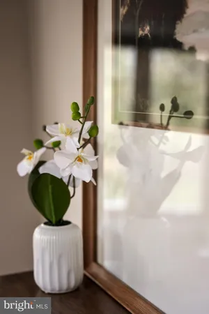a vase of flowers sitting on a table