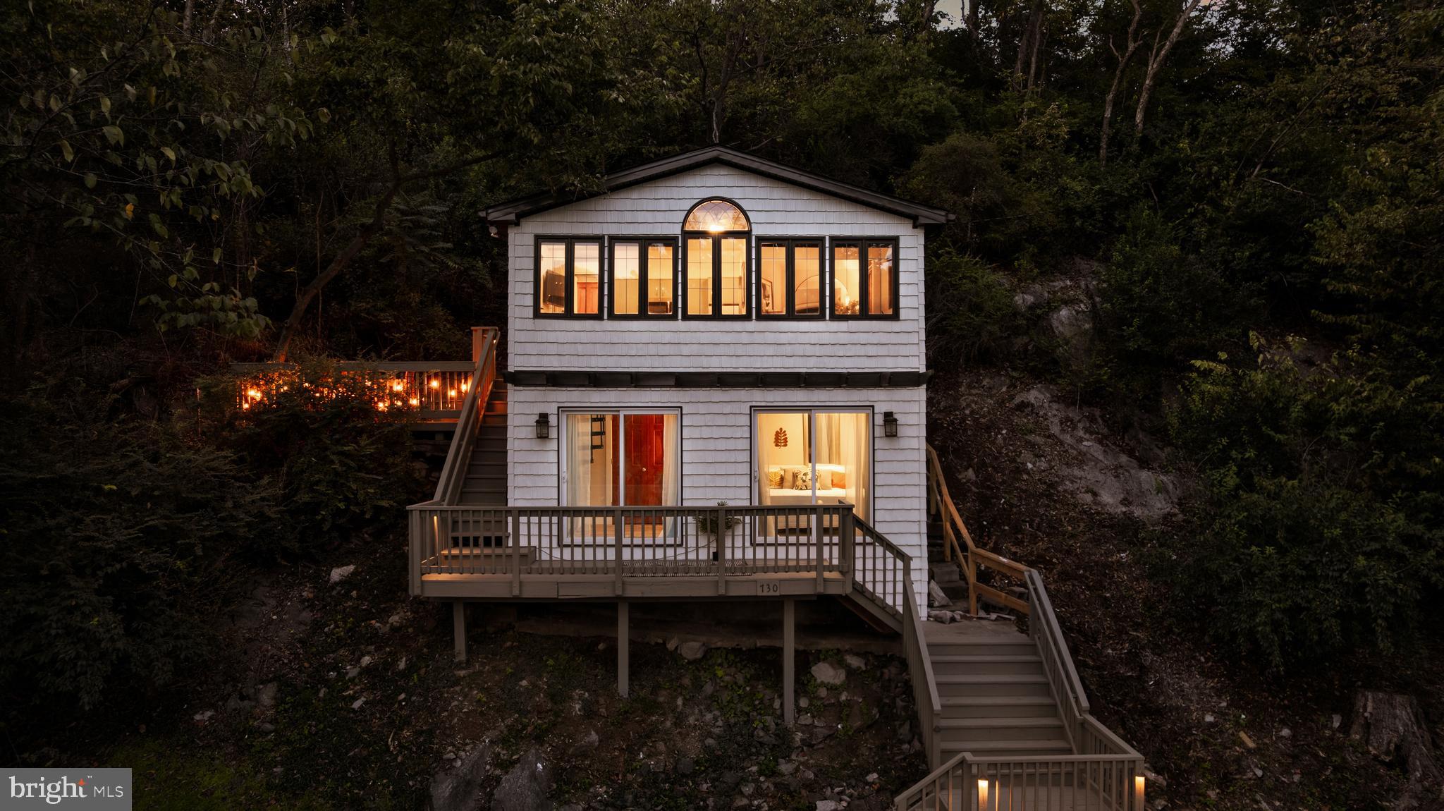 730 Bennys Beach Road Front Royal, VA 22630 - Photo 2 of 44 a front view of a house with a yard