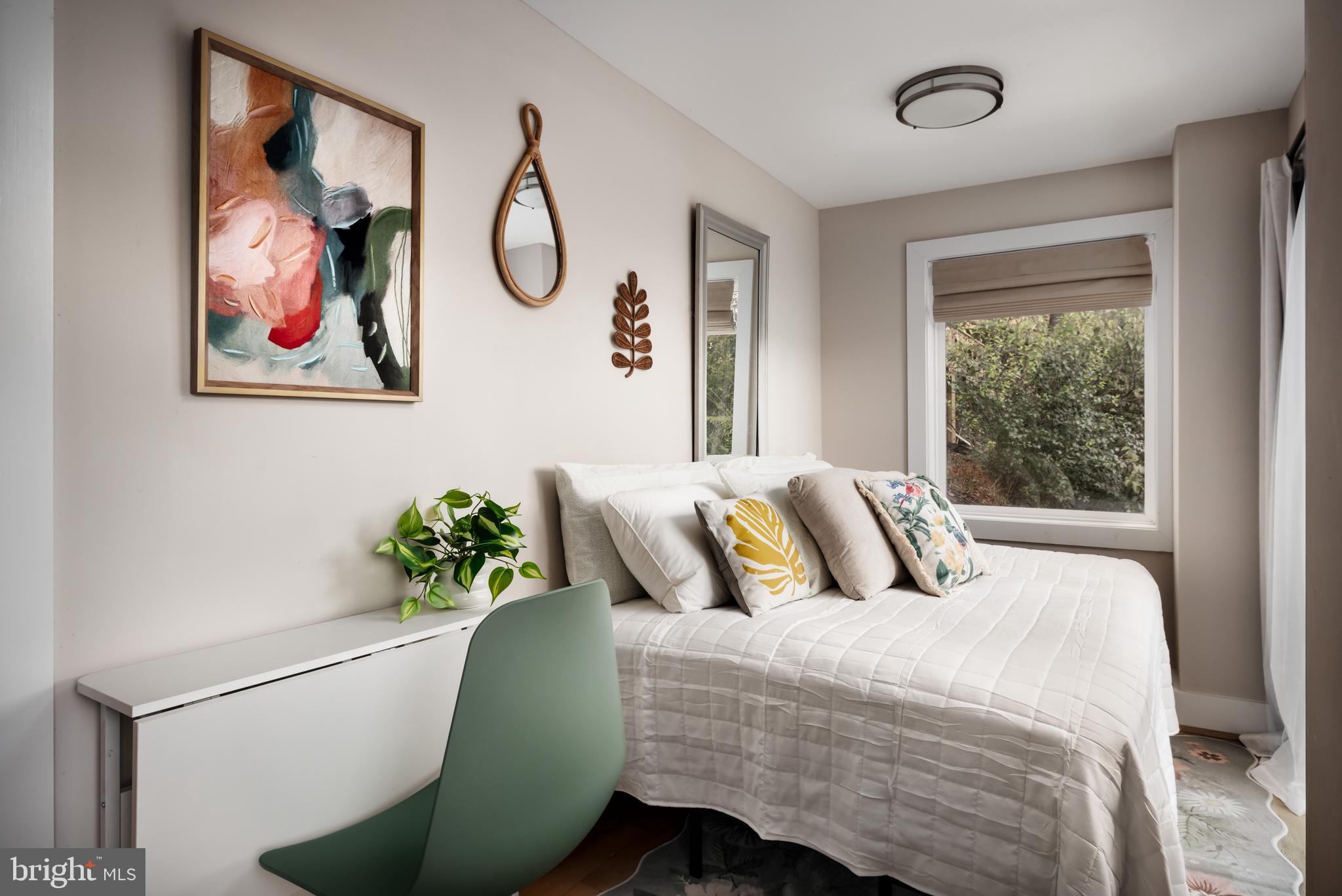 730 Bennys Beach Road Front Royal, VA 22630 - Photo 28 of 44 a bedroom with a bed and a painting on the wall