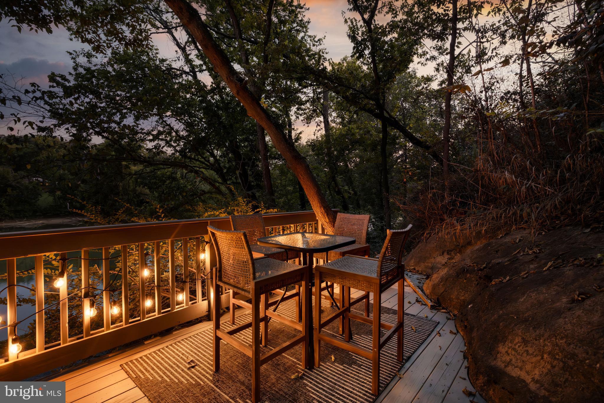 730 Bennys Beach Road Front Royal, VA 22630 - Photo 33 of 44 a view of a chairs and table in the balcony