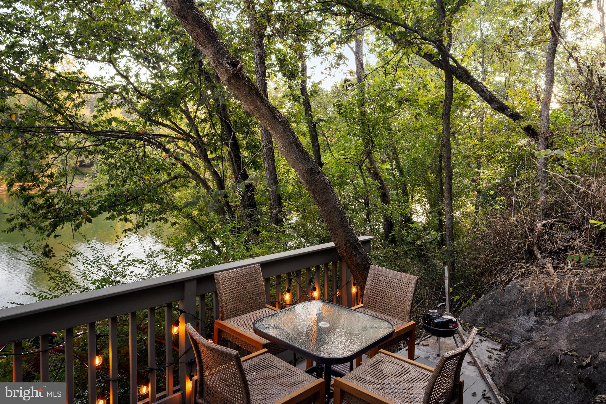 730 Bennys Beach Road Front Royal, VA 22630 - Photo 35 of 44 a balcony with wooden floor and fence