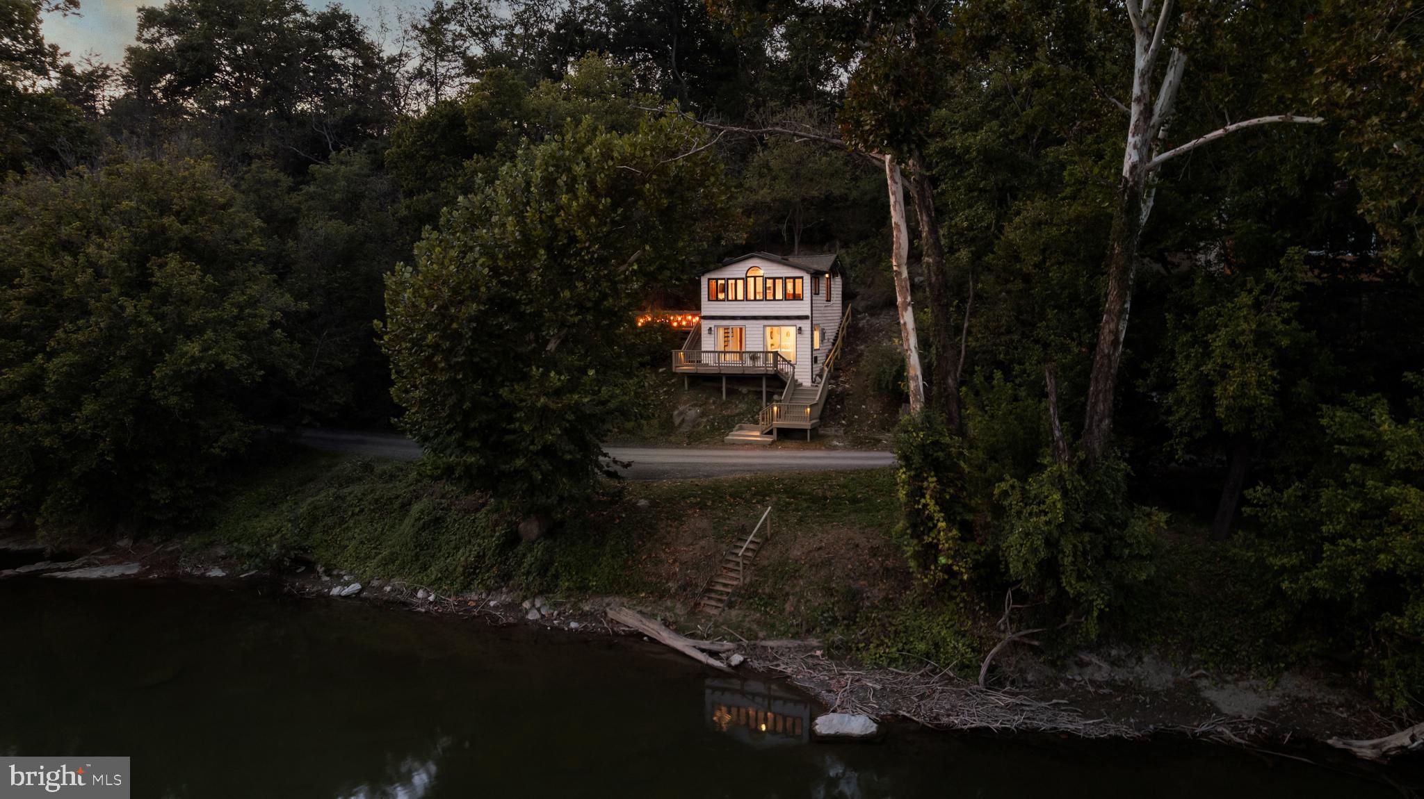 730 Bennys Beach Road Front Royal, VA 22630 - Photo 39 of 44 a view of a back yard of a house with a yard