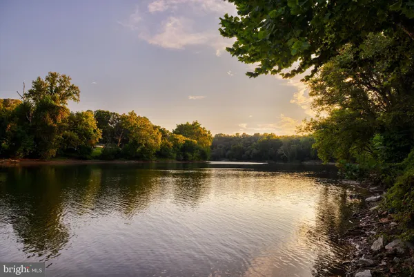 a view of a lake with a house