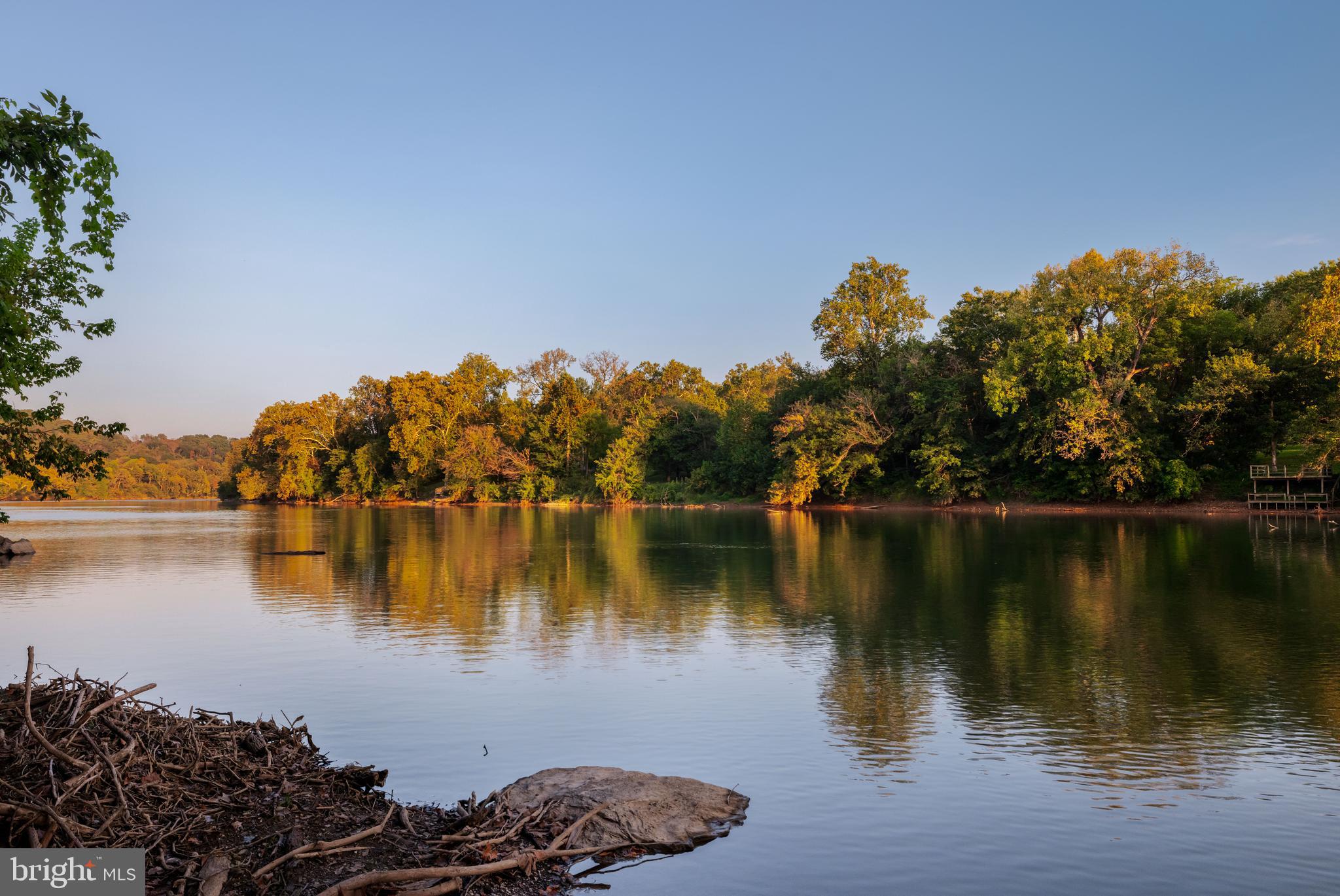 730 Bennys Beach Road Front Royal, VA 22630 - Photo 44 of 44 a view of a lake with a house