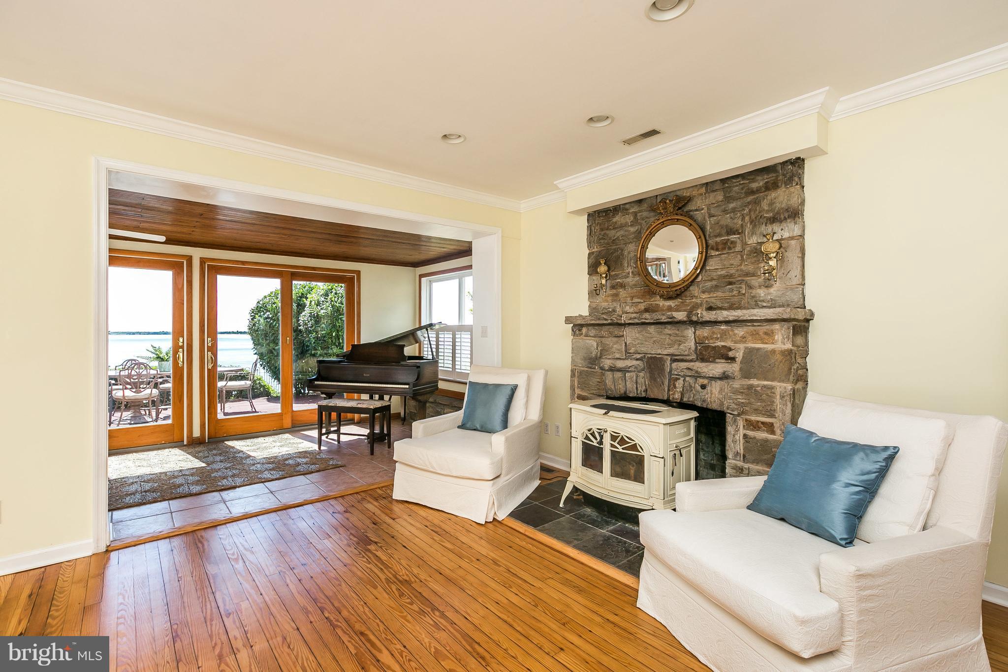2507 Barrison Point Road Baltimore, MD 21221 - Photo 11 of 30 Living Room with wood stove insert