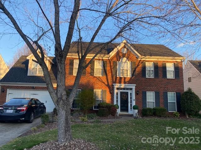9724 Steele Meadow Road Charlotte, NC 28273 - Photo 1 of 21 a house view with a garden space