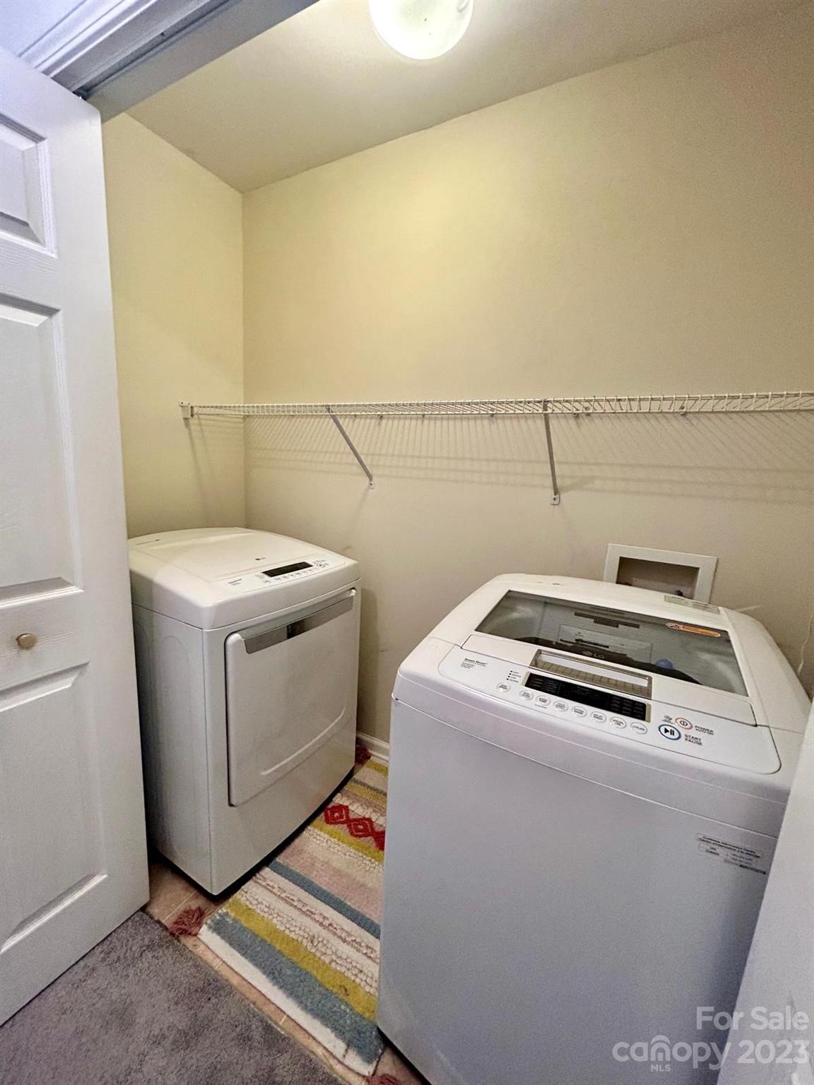 9724 Steele Meadow Road Charlotte, NC 28273 - Photo 20 of 21 a utility room with dryer and washer