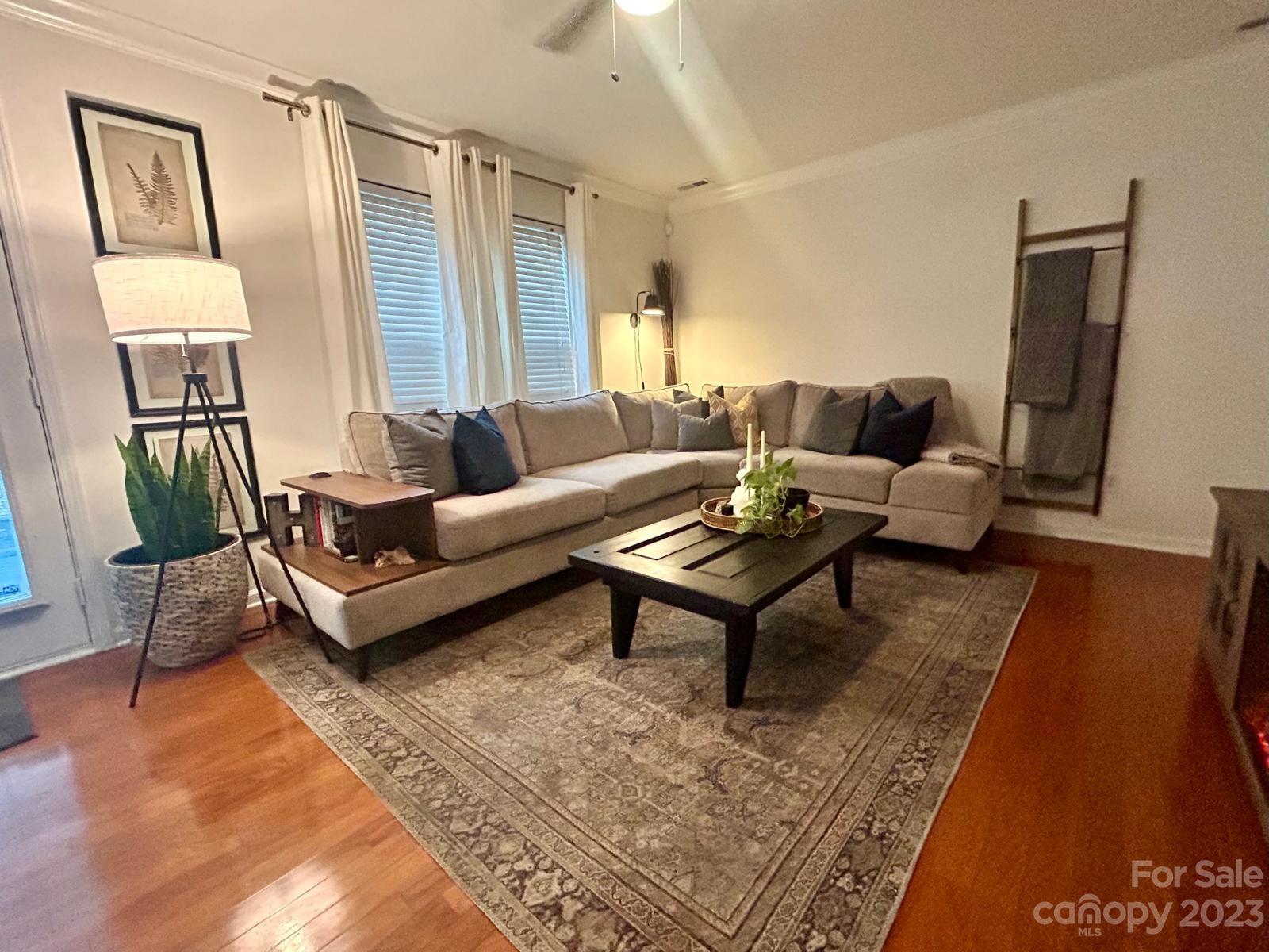 9724 Steele Meadow Road Charlotte, NC 28273 - Photo 3 of 21 a living room with furniture and a window