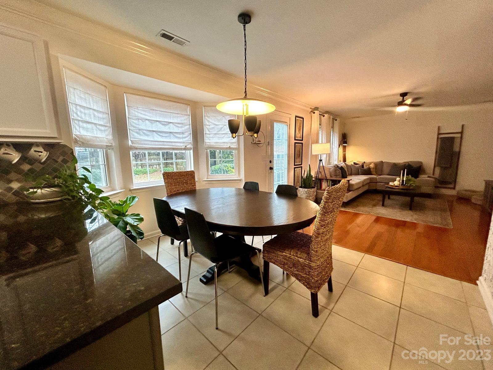 9724 Steele Meadow Road Charlotte, NC 28273 - Photo 4 of 21 a dining room with furniture and window