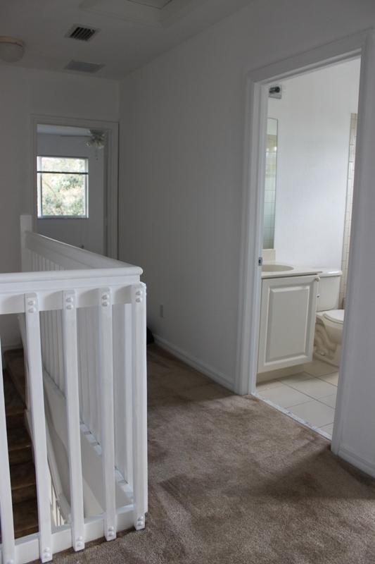 1910 Hibiscus Lane Riviera Beach, FL 33404 - Photo 3 of 9 UPSTAIRS HALLWAY