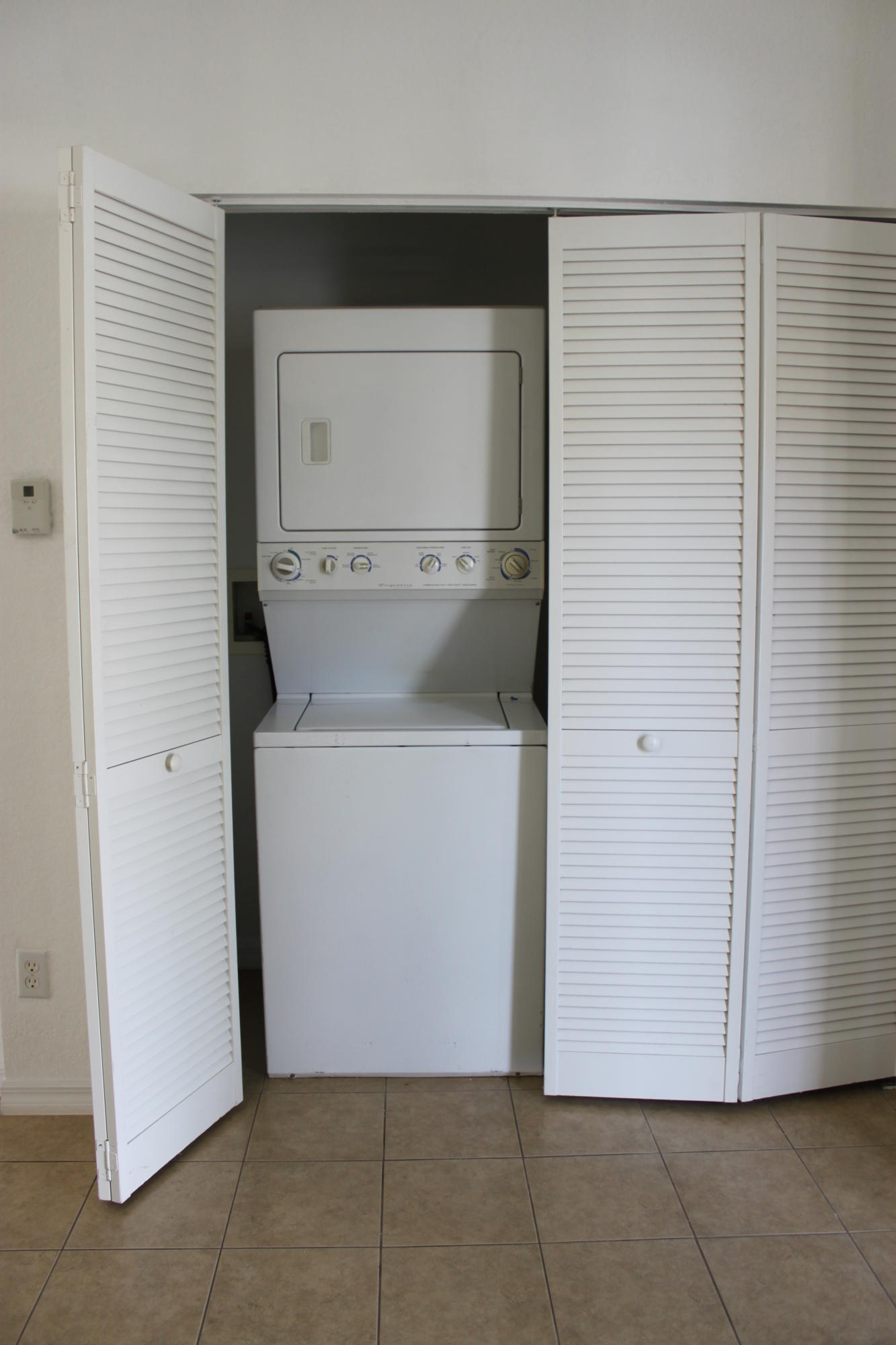 1910 Hibiscus Lane Riviera Beach, FL 33404 - Photo 7 of 9 WASHER /DRYER IN KITCHEN