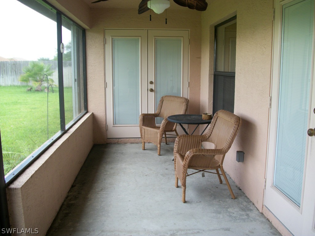1019 Caribbean Avenue Clewiston, FL 33440 - Photo 14 of 16 a view of two chairs in the balcony