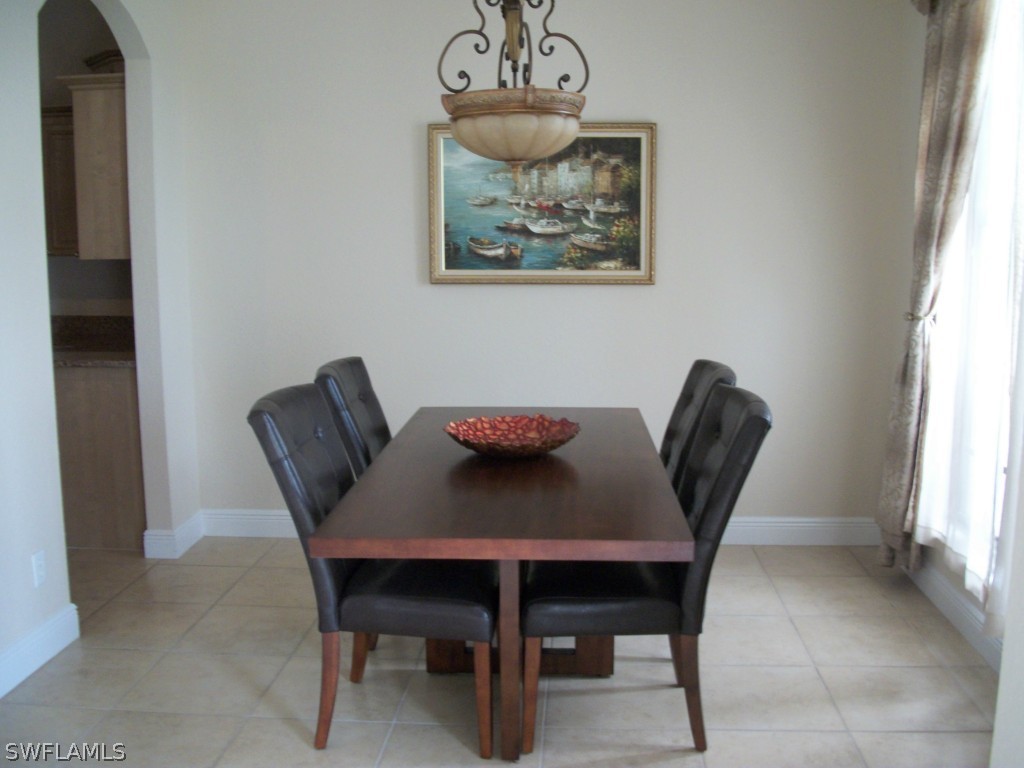 1019 Caribbean Avenue Clewiston, FL 33440 - Photo 4 of 16 a view of a dining room with furniture