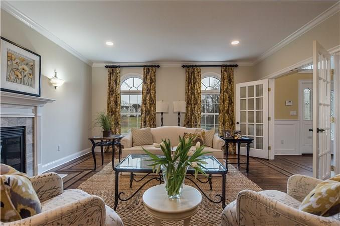92 Rock House Road Easton, CT 06612 - Photo 1 of 1 a living room with furniture and a large window