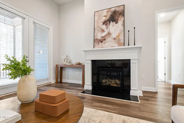 a spacious bedroom with a bed and a window