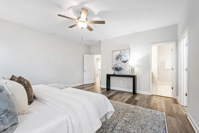 a bathroom with a shower and a toilet