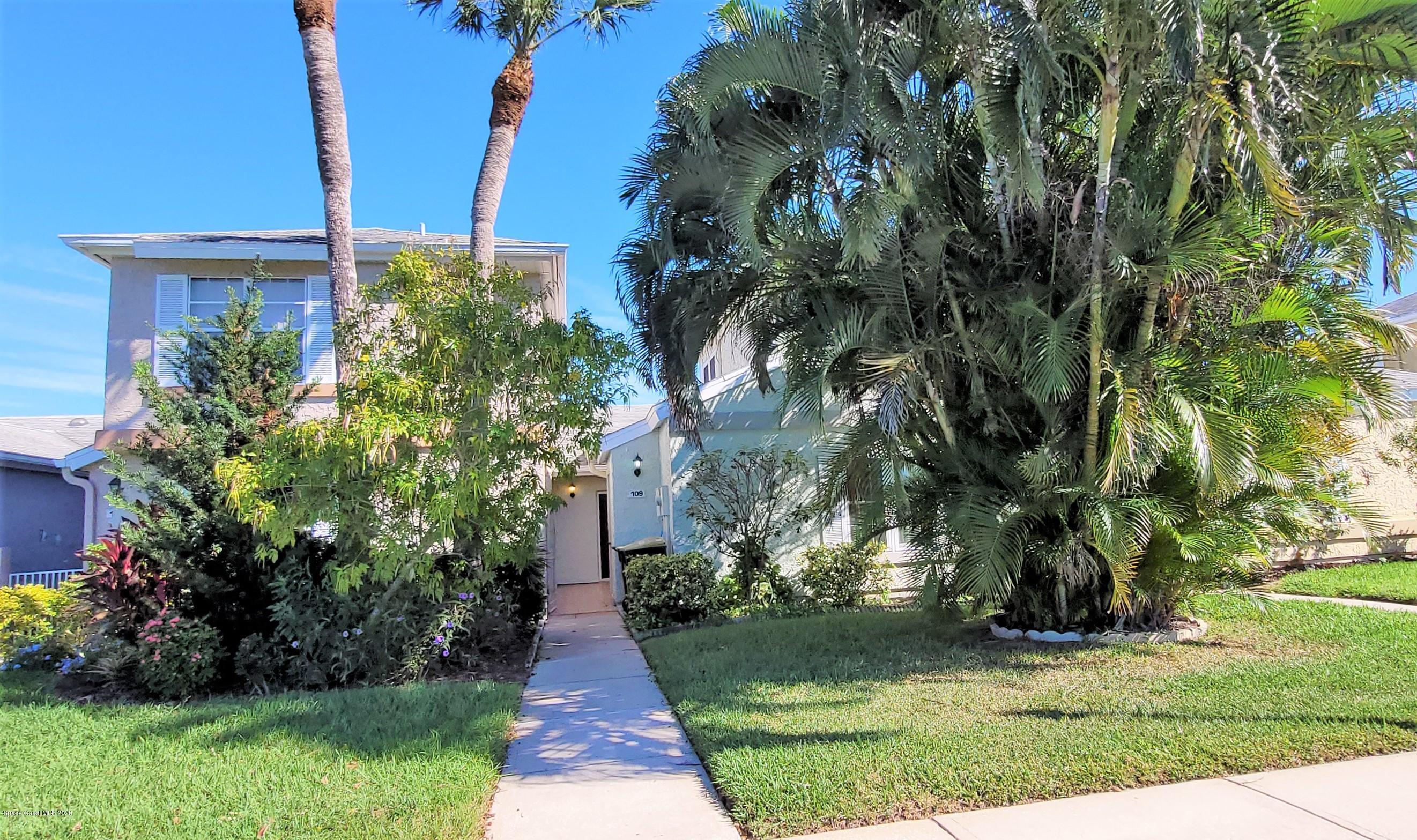 a view of a park with a tree