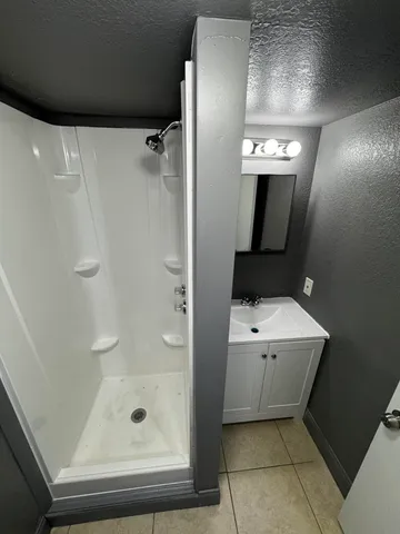 a view of a hallway with washer and dryer