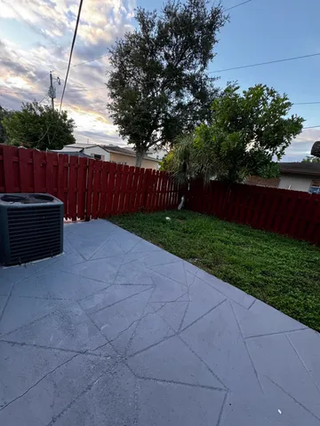 a view of backyard with green space