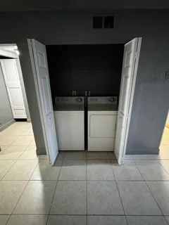 a view of a livingroom with furniture