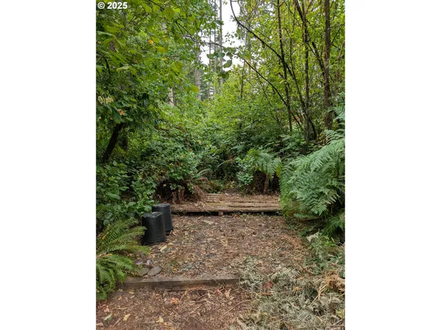 a picture of a bathroom with a bench