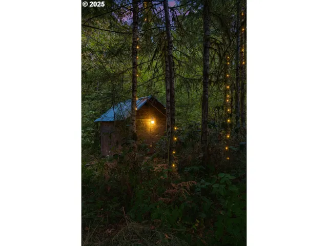 a picture of a bathroom with a sink and shower