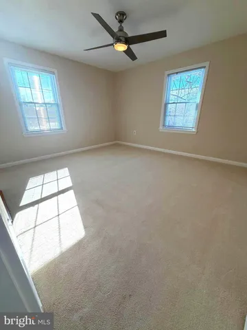 an empty room that has a window