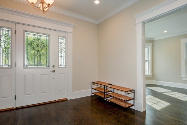 234 Langley Road Newton, MA 02459 - Photo 3 of 25 an empty room with windows