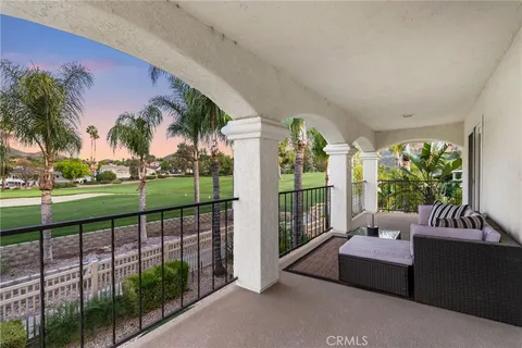 a front view of house with yard and seating space