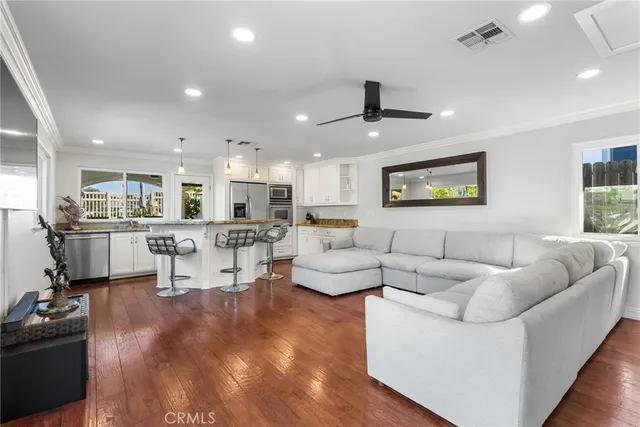 a spacious bedroom with a bed and a table