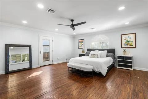 a bathroom with a granite countertop sink a shower and a mirror