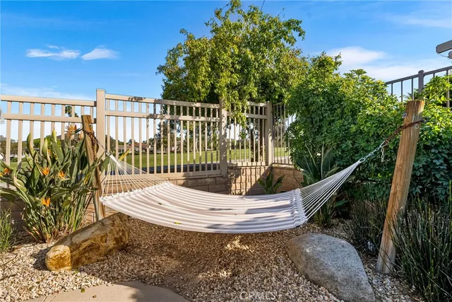 an aerial view of residential houses with outdoor space and swimming pool