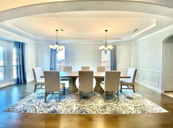 a view of a dining room with furniture