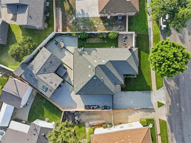 an aerial view of a house with a garden