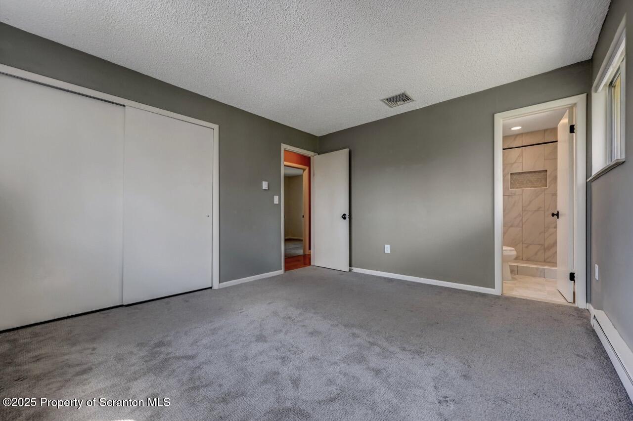 219 Noble Road Clarks Summit, PA 18411 - Photo 20 of 47 a view of an empty room