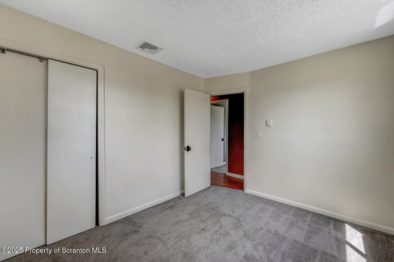 219 Noble Road Clarks Summit, PA 18411 - Photo 27 of 47 a view of an empty room