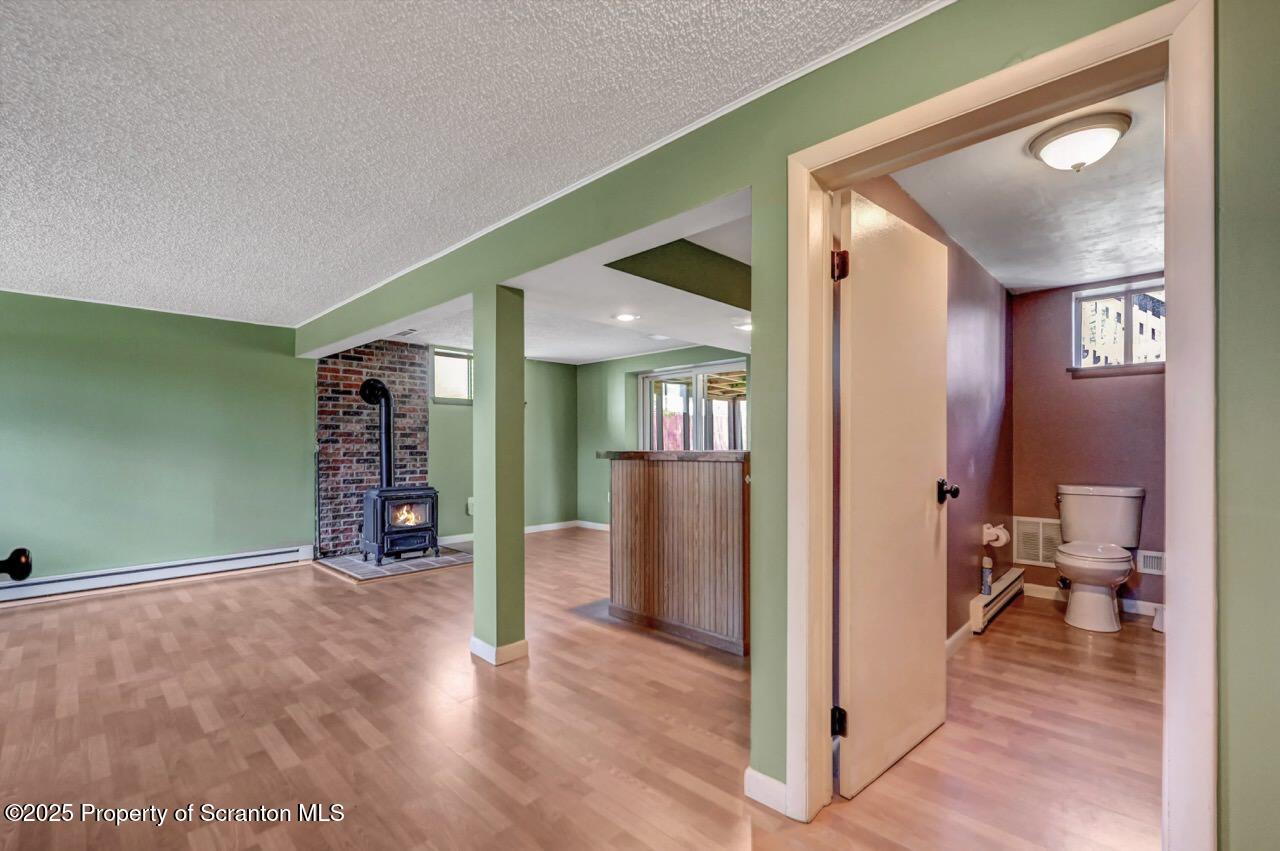 219 Noble Road Clarks Summit, PA 18411 - Photo 30 of 47 a view of a hallway to a livingroom with furniture
