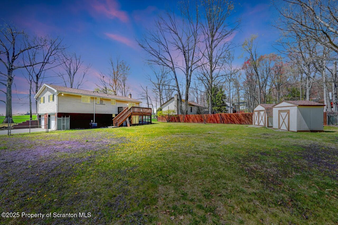 219 Noble Road Clarks Summit, PA 18411 - Photo 4 of 47 a house view with a play ground in front of it