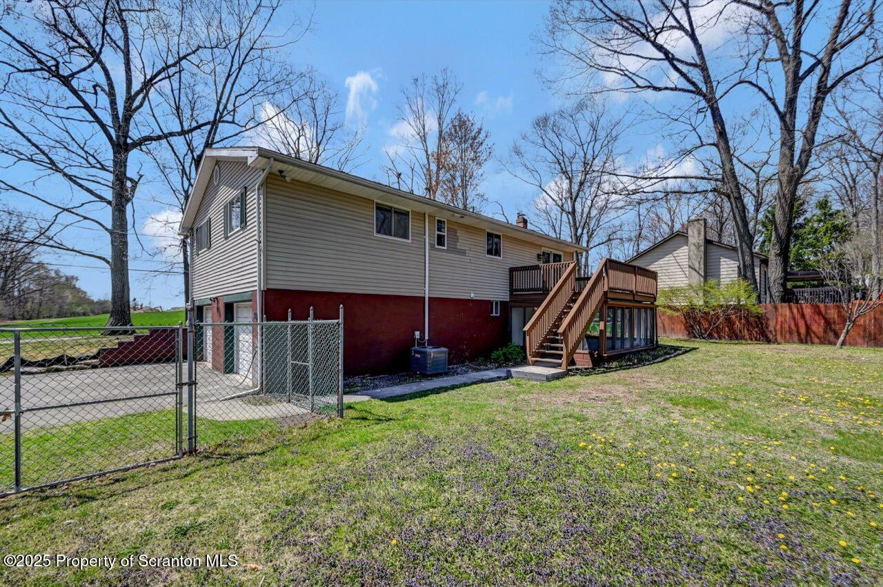 219 Noble Road Clarks Summit, PA 18411 - Photo 43 of 47 a view of a house with yard and a tree