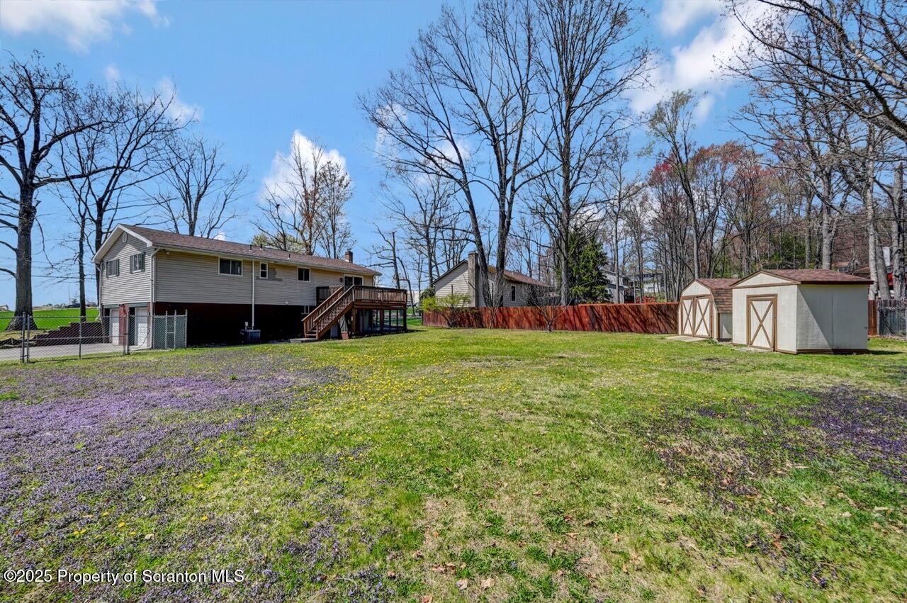 219 Noble Road Clarks Summit, PA 18411 - Photo 5 of 47 a house view with a sitting space and garden