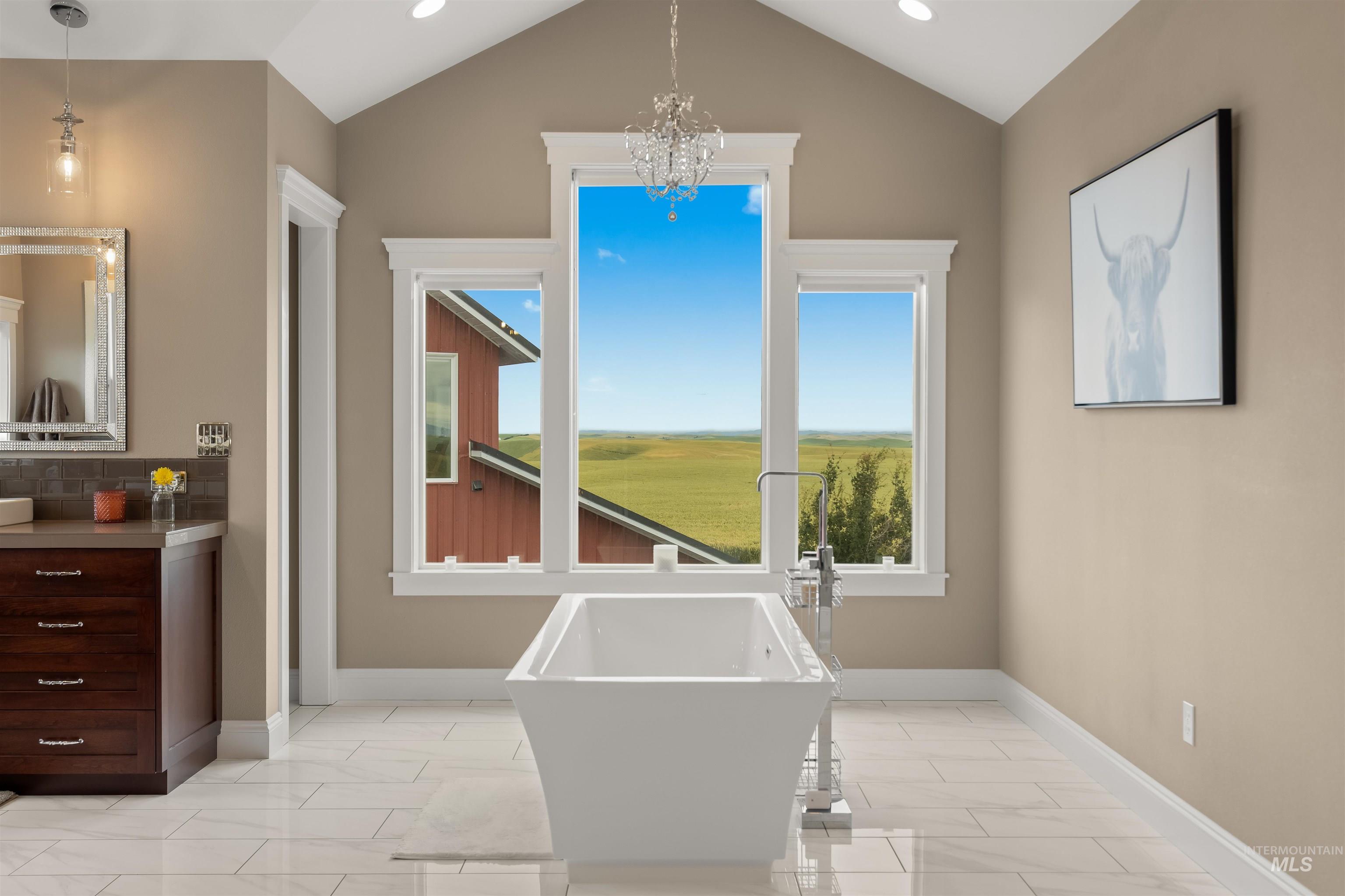1513 Uniontown Road Genesee, ID 83832 - Photo 23 of 50 Hallway featuring light-toned tile flooring, white crown molding, and recessed lighting
