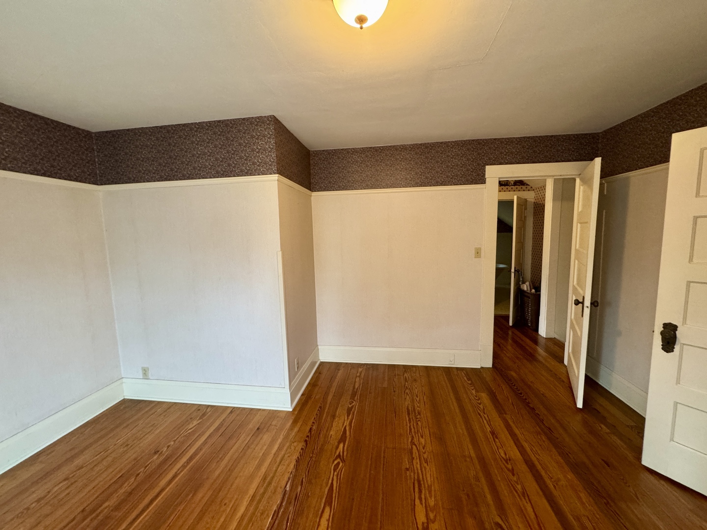 221 West Peru Street Princeton, IL 61356 - Photo 16 of 33 a view of empty room with wooden floor
