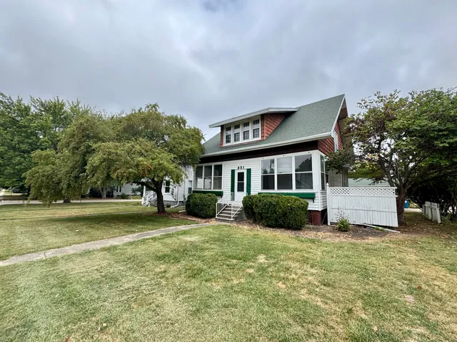 a view of a yard in front of a house