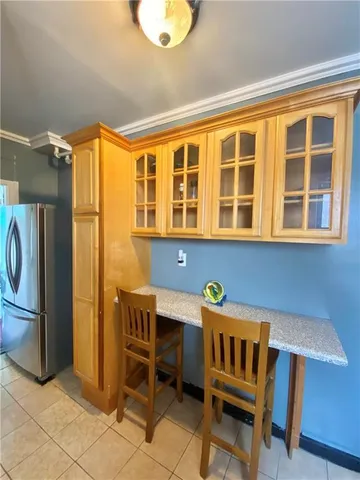 a view of a chairs and a table in a room