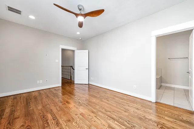 a bathroom with a bathtub and a sink