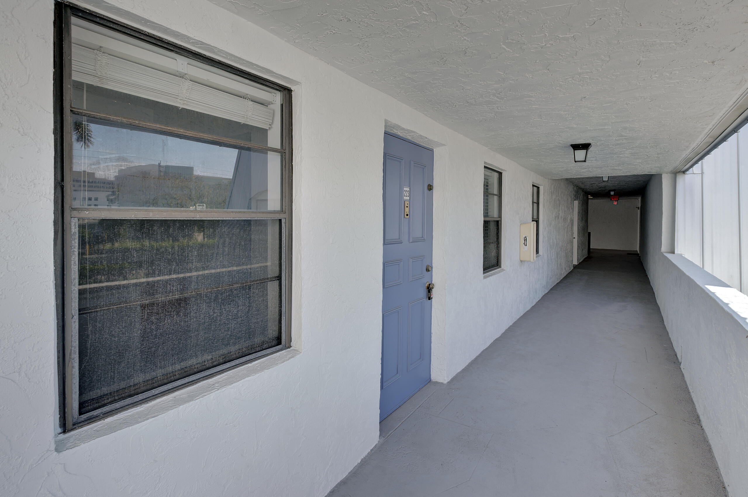 825 Northwest 13th Street, Unit 223 Boca Raton, FL 33486 - Photo 17 of 42 a view of an empty room with a window