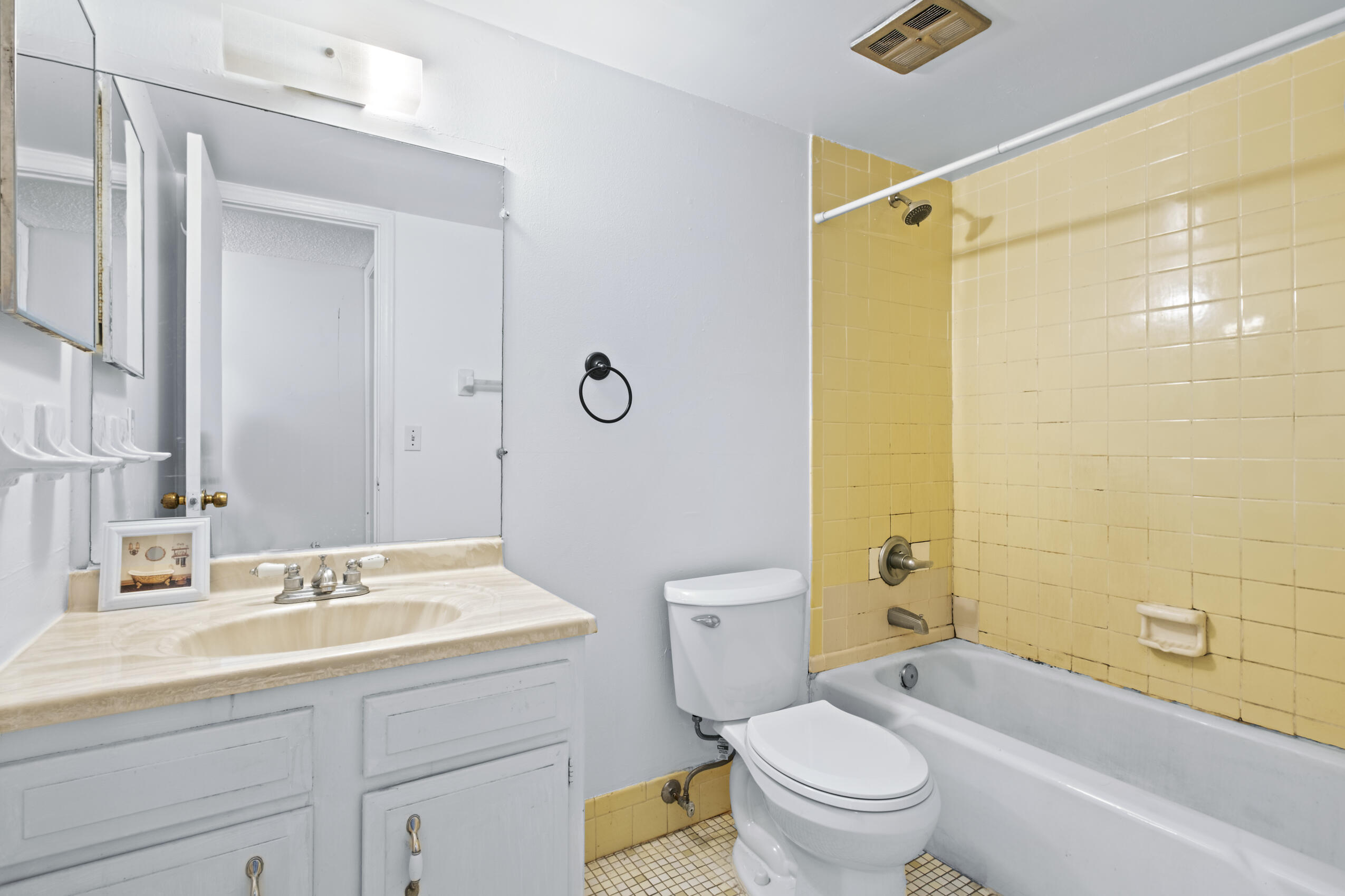 825 Northwest 13th Street, Unit 223 Boca Raton, FL 33486 - Photo 23 of 42 a bathroom with a sink a toilet and a bathtub